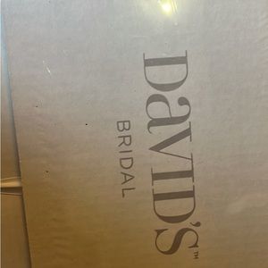 White wedding dress unknown size, boxed up after worn